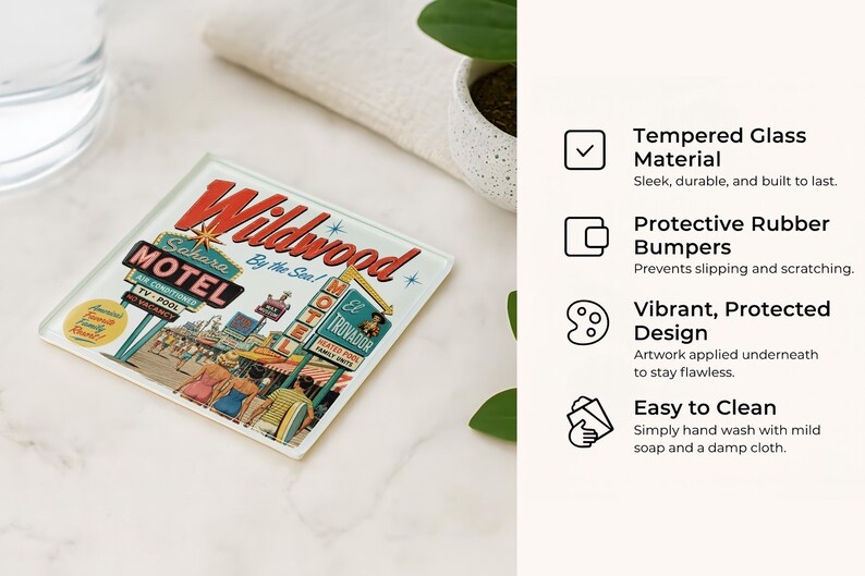a retro-style coaster with a vintage motel advertisement, placed on a white marble surface next to a glass of water and a potted plant.