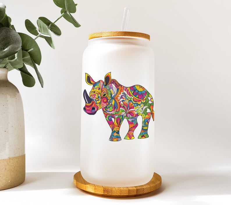 a glass jar with a picture of a rhino on it