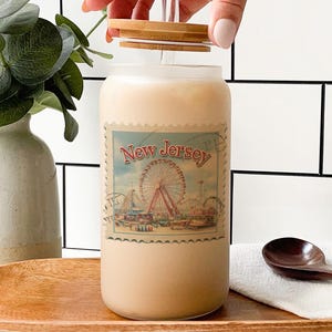 a bottle of liquid with a picture of a ferris wheel on it