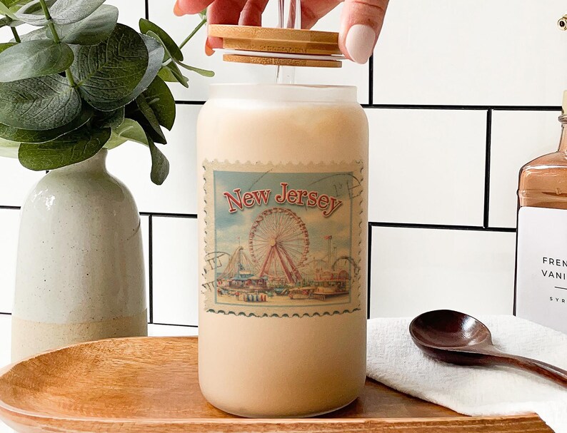 a bottle of liquid with a picture of a ferris wheel on it