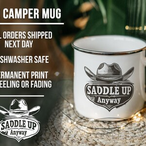 a white coffee mug with a cowboy hat on it