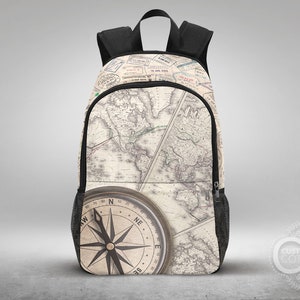 May include: A black backpack with a vintage world map and compass design. The map is in shades of brown and cream, with a compass in the center. The backpack has a zipper closure and adjustable straps.