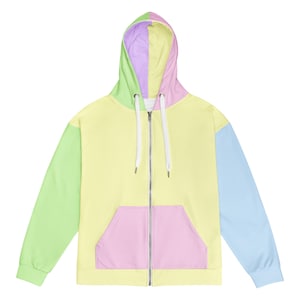 May include: A pastel-colored zip-up hoodie. The hoodie features a color-block design with a light yellow body, a pink pocket, and sleeves in light green and blue. The hood is split between lavender, pink, and light green.