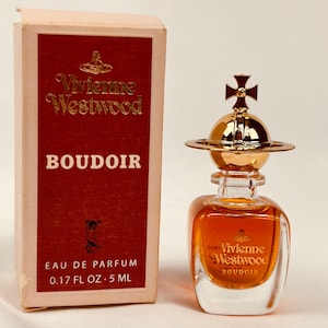 Boudoir MINI by Vivienne Westwood. This sensual scent comes in a 5mL miniature bottle. Please note box has imperfections.