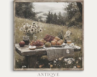 May include: A vintage-style painting of a rustic wooden table set in a field with a view of a forest in the background. The table is covered with a checkered tablecloth and a bowl of fruit, including apples, pears, and grapes. There are also flowers in a vase on the table.
