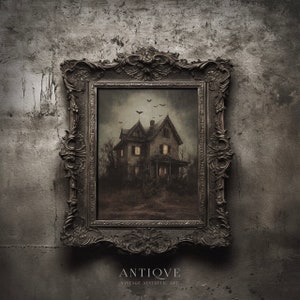 May include: An antique framed artwork featuring a spooky house with lit windows under a dark sky with flying birds. The ornate, dark-colored frame surrounds the vintage aesthetic art. The word "ANTIQVE" is at the bottom of the image.