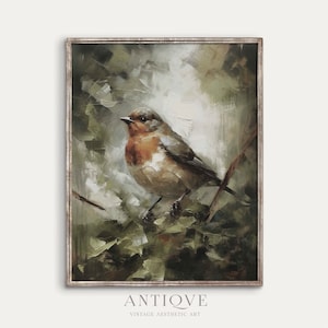 May include: A painting of a robin perched on a branch with green leaves. The bird is painted in a realistic style with brown, orange, and gray feathers. The background is a soft, muted green and white.