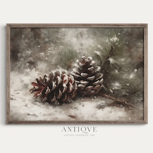May include: Two pine cones covered in snow, resting on a bed of white snow. The pine cones are brown with a reddish hue and have a textured surface. The background is a blurred image of a pine branch and a snowy forest.