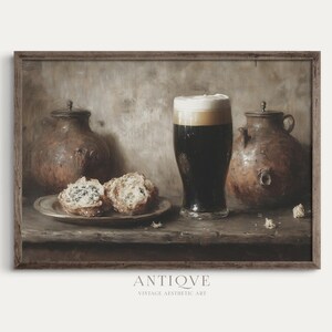May include: A still life painting depicting a glass of dark beer, two brown ceramic jugs, and two pastries on a wooden table. The painting has a vintage aesthetic.
