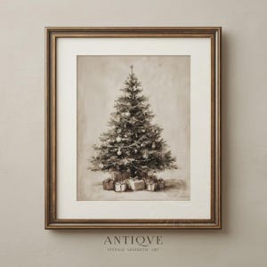 May include: Sepia-toned framed print of a Christmas tree decorated with baubles and garland, with wrapped presents beneath. The artwork is labelled "ANTIQVE VINTAGE AESTHETIC ART" at the bottom, set within a gold-coloured frame.