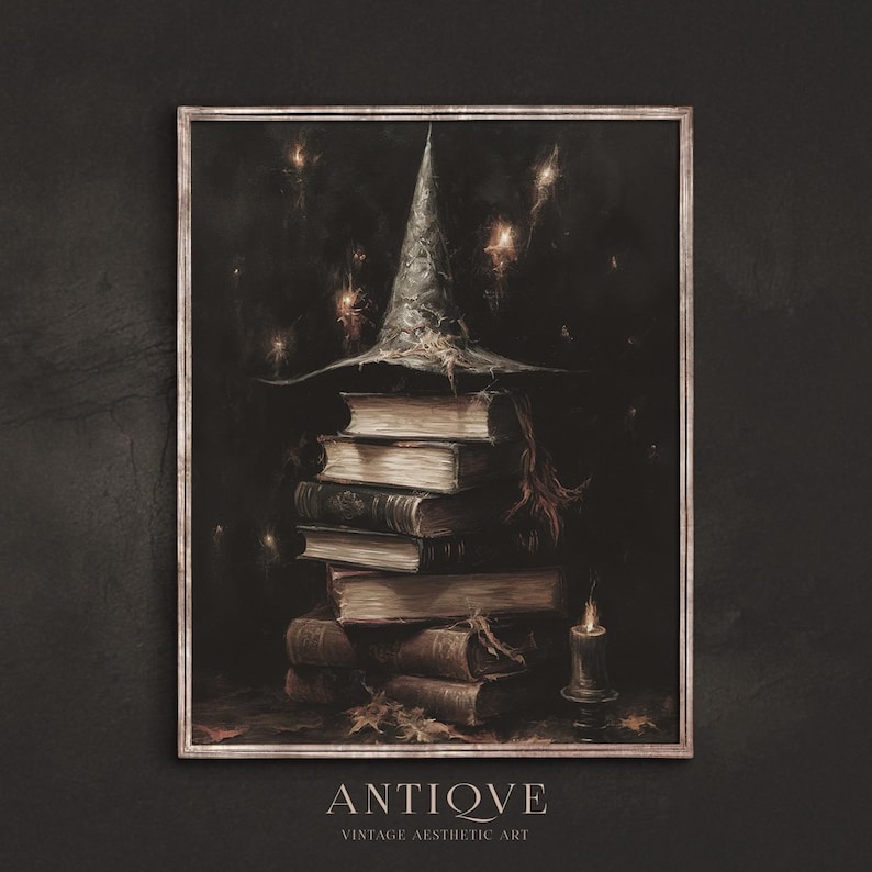 May include: A vintage-style framed print featuring a stack of old books topped with a witch's hat. A lit candle sits to the right, with sparkling lights in the background. The text "ANTIQVE" and "VINTAGE AESTHETIC ART" are at the bottom.