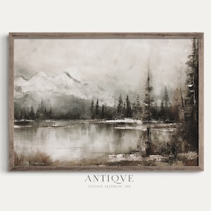May include: A painting depicting a mountain lake scene with a snow-capped mountain range in the background, a forest of dark green trees, and a still, reflective lake in the foreground. The painting is executed in a muted palette of browns, greys, and greens, and has a vintage aesthetic.