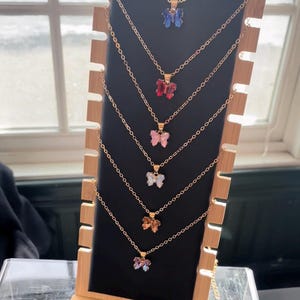 Butterfly gemstone pendant necklaces