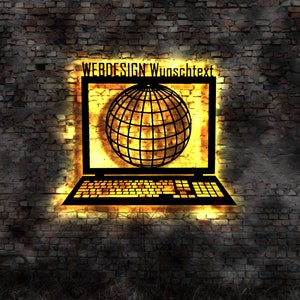 Może przedstawiać: Świecący neonowy znak z laptopem, w którym na ekranie znajduje się globus. Znak głosi "WEBDESIGN Wunschtext".