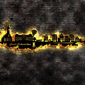 Skyline Bad Schwartau  LED Wandbild Holz Stadt AK Karte Map Stadtplan Wandsticker Leuchtbild Neonreklame Wandtattoo Reiseführer Silhouette