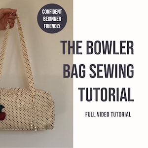 May include: A cream-colored bowler bag with small black polka dots, featuring two long shoulder straps, a cherry-shaped charm, and a dangling pearl accent. The text reads: CONFIDENT BEGINNER FRIENDLY, THE BOWLER BAG SEWING TUTORIAL, FULL VIDEO TUTORIAL.