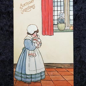 c.1910 Cartolina - Ragazza che tiene in braccio una bambola - Publ. E. Mack