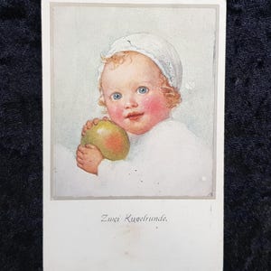 Carte postale autrichienne de 1917 - Joli bébé avec pomme, traduction « Deux boules rondes » - Édition M.M. Wein