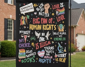 May include: A black garden flag with colorful text and illustrations. The flag includes phrases like "Feminism is for Everyone," "Black Lives Matter," and "Human Rights." Other text includes "Love is Love," "Trans Rights are Human Rights," and "Science is Real."