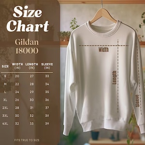 Puede incluir: Una sudadera blanca Gildan 18000 con una tabla de tallas. La tabla muestra medidas en pulgadas para ancho, largo y largo de manga, desde la talla S hasta la 4XL. El texto "Size Chart" est&aacute; en la parte superior.