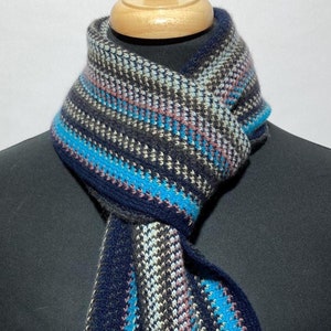 Cashmere warp knitted scarf in contemporary multi colour stripes. Designed and Made in Scotland