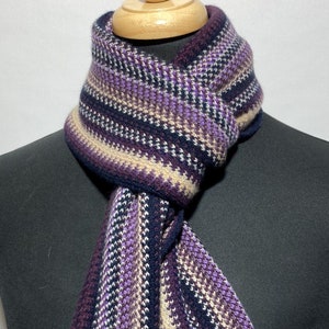 Cashmere warp knitted scarf in contemporary multi colour stripes. Designed and Made in Scotland