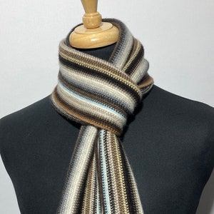 Lambswool warp knitted scarf in contemporary multi colour stripes. Designed and Made in Scotland