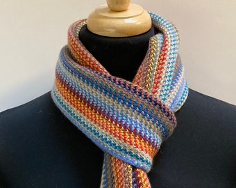 Cashmere warp knitted scarf in contemporary multi colour stripes. Designed and Made in Scotland