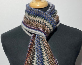 Lambswool warp knitted scarf in multi colour zigzag pattern. Designed and Made in Scotland