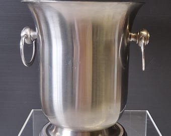 Très joli seau à champagne en inox 18/10 de chez Jean Couzon en très bon état