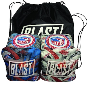May include: A set of four cornhole bags with a black drawstring bag. The bags are printed with a brick wall pattern and the words "BLAST" and "PRO SERIES APPROVED BAGS". The bags are also printed with a logo that says "ACD WE ARE CORNHOLE".