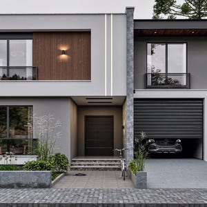 Pode incluir: Casa moderna de dois andares com exterior cinza e branco, com garagem, varanda e uma parede de destaque em madeira escura. Um carro está estacionado na garagem e uma bicicleta está em frente à entrada. O paisagismo inclui arbustos e gramíneas ornamentais.