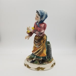 Capodimonte old woman porcelain figurine