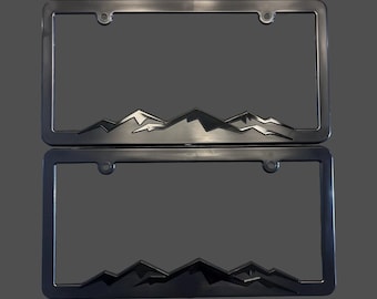 Two Blackout Mountain Raised Imprint License Plate Frame