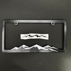 White Cap Mountains License Plate Frame with Black Dome Decal