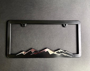 Shiny Chrome Mountains Plastic License Plate Frame