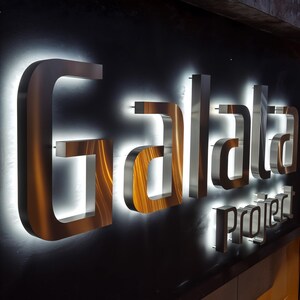 silver shiny mirrored custom backlit sign silver brushed letters , stainless steel sign
