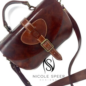 Hand stitched leather saddle bag