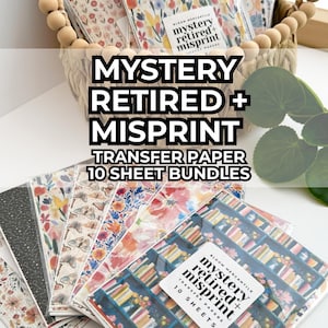 May include: Bundles of transfer paper with floral and patterned designs. The text "MYSTERY RETIRED + MISPRINT" is displayed prominently. Each bundle contains 10 sheets. The bundles are in a woven basket.