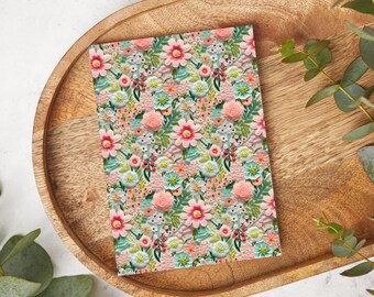 May include: A floral pattern with pink, white, and green flowers on a light pink background.