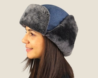 Light Blue Woolen trapper hat . A unisex aviator style hat with earflaps. Great fit , unique style .