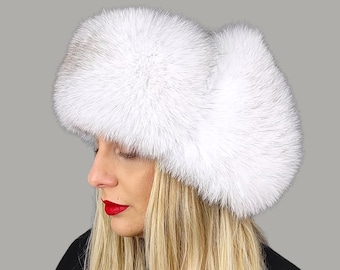 Carie Lynn Fur hat . Blue fox fur hat with white leather . Women&#39;s fashionable fox trapper hat. Great fit , extremely fancy hat .