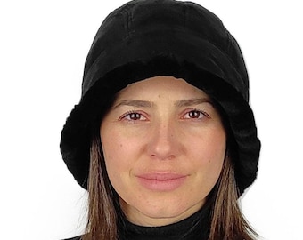 A black sheepskin cloche hat for women . Unique in style , superb sense , great fit. Gift idea for her