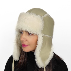 Creme trapper hat . An aviator style hat for men and women with earflaps & leather strings. Great fit . Gift for her