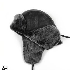 Black Sheepskin aviator hat, trapper hat, unisex hat. Hat with earflaps & leather strings. Ideal fit, easy to wear. Great gift idea