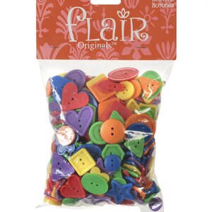 May include: A bag of 12 ounces (340g) of colorful plastic buttons in various shapes, including hearts, squares, circles, and stars. The bag is labeled "Flair Originals" and "Buttons, Boutons, Botones".