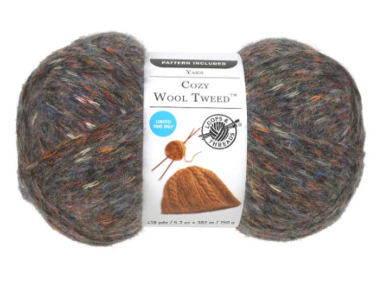 May include: A skein of Cozy Wool Tweed yarn in a multi-colored tweed pattern. The yarn is a blend of wool and acrylic and is machine washable. The skein is 418 yards / 382 meters and is 100 grams. The label also includes a pattern for a hat.