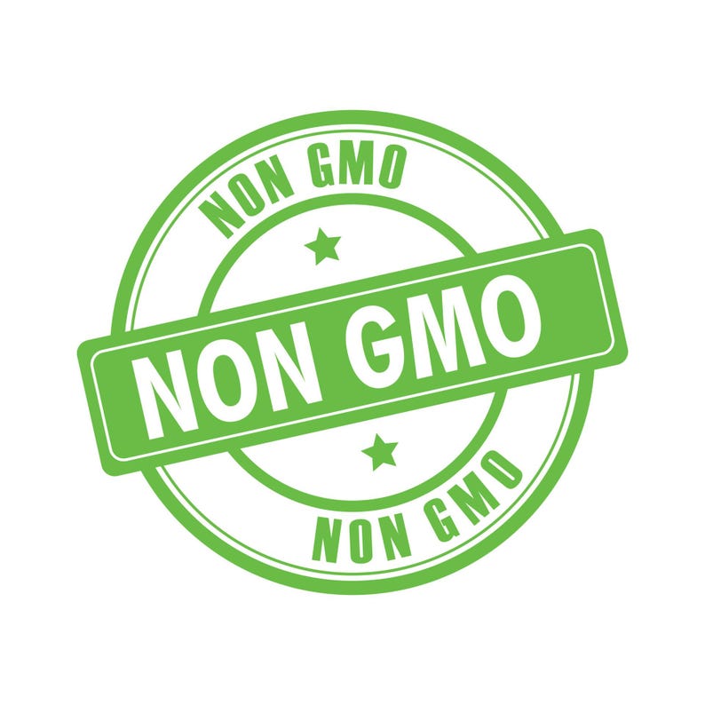 May include: A green and white "NON GMO" stamp. The stamp is circular with the words "NON GMO" in a circle around the outside. The words "NON GMO" are also in a rectangular shape across the centre.