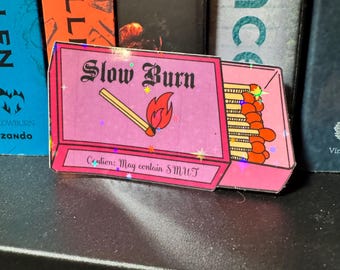 Sticker boîte d'allumettes à combustion lente – Étiquette d'avertissement Booktrope
