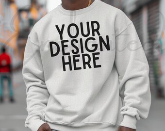 May include: A white sweatshirt with the text "YOUR DESIGN HERE" printed in black.